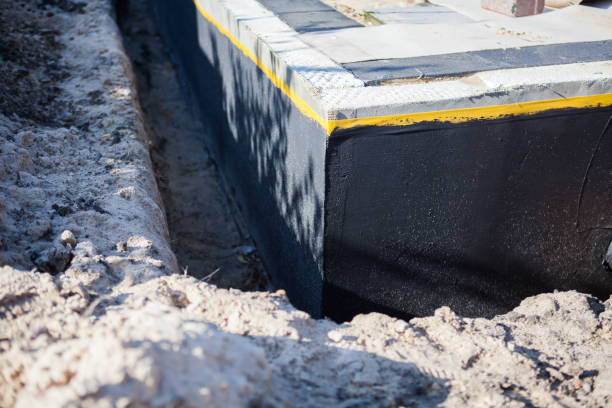 Professional Waterproofing technician working in Lima, PA
